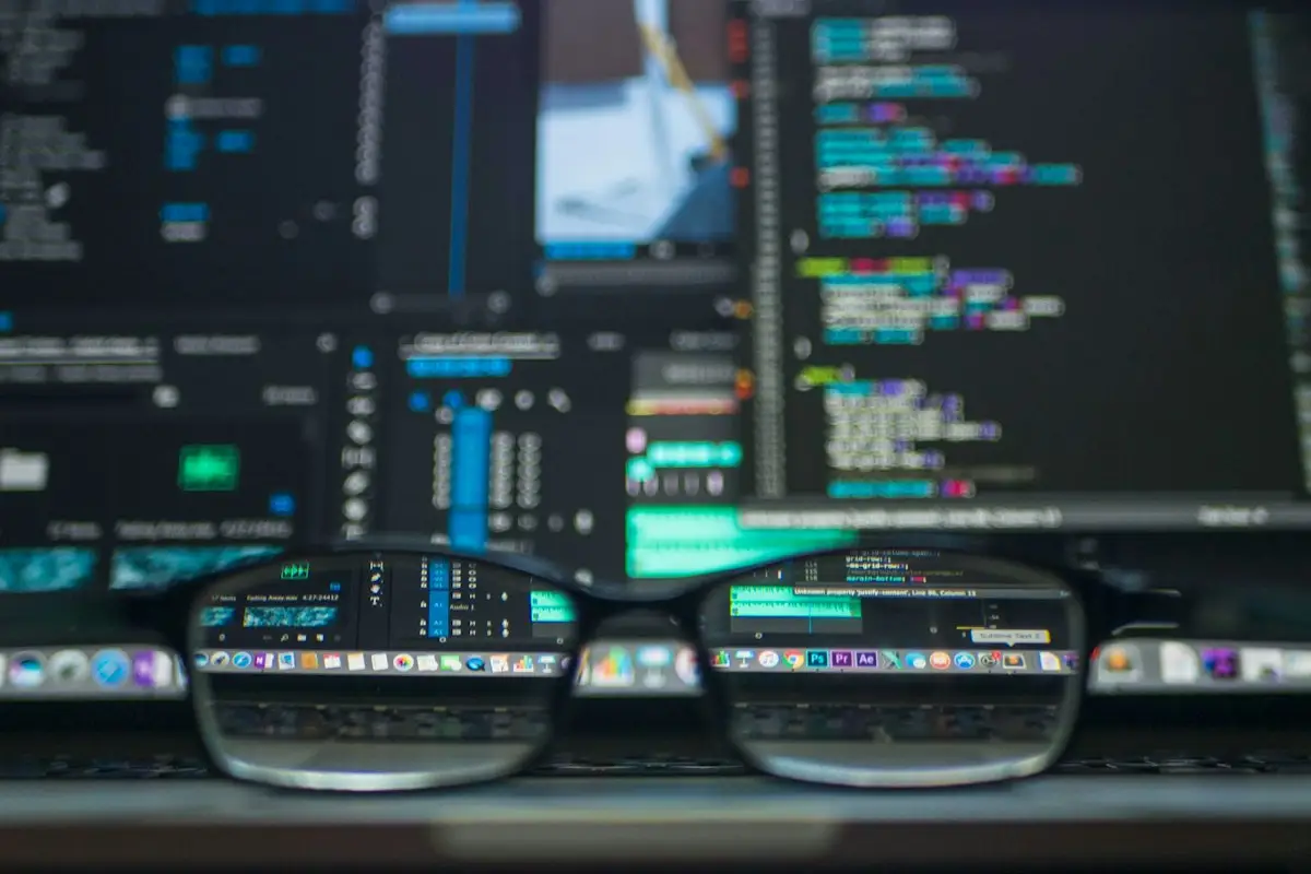 Code on monitors seen through a pair of glasses
